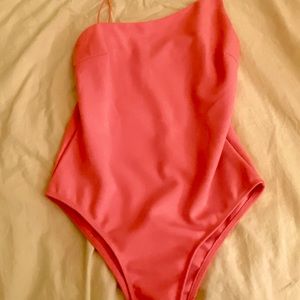 Vibrant pink body suit. Princess Polly